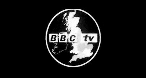 the bbc tv logo is shown in this black and white photo with an oval shape