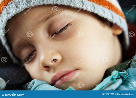 Tired Child Sleeping In Waiting Room For Passengers. Stock Image ...