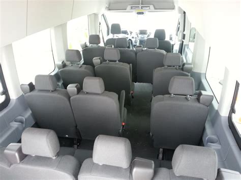 Huber's Auto Group - High Top Transit 15 Passenger Vans