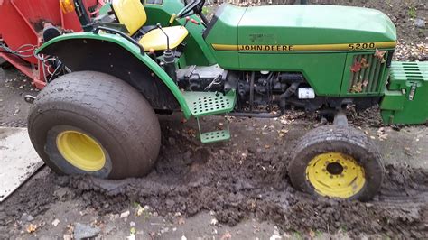 Tractor stuck in the mud | weluvgolf.com