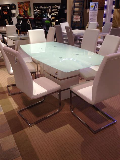 Love this modern dining room table & chairs at Leon's. #leonsCAE Dining ...