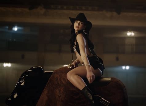 Dua Lipa turns into a chaotic cowboy in the video for "Love Again"