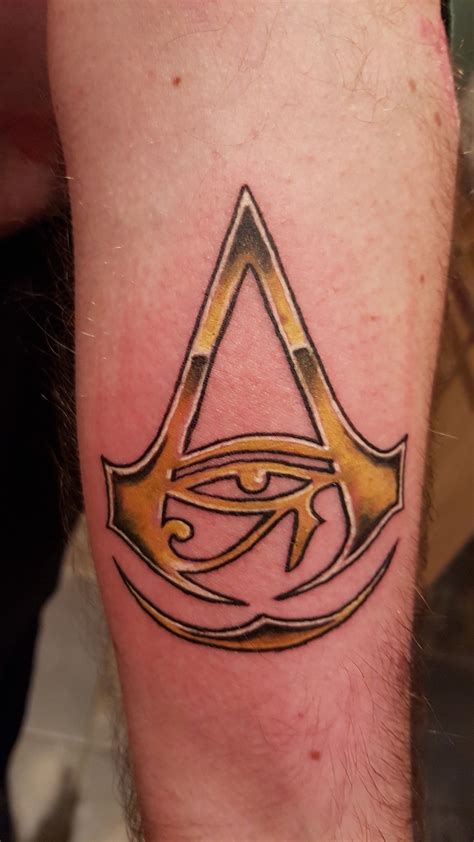 Assassins creed origins tattoo on hubbies forearm. | Assassins creed ...