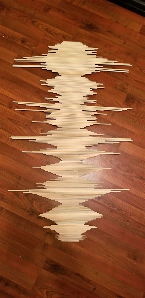 Wooden dowels wall art | Woodworking projects diy, Wooden diy, Wooden ...