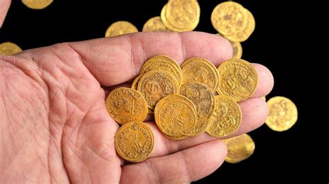 Gold coins hidden in 7th Century found in wall - BBC News