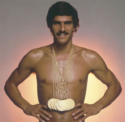 American swimmer Mark Spitz poses with the seven gold medals he won at ...