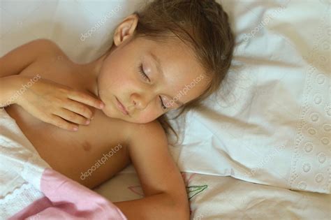 Sleeping little girl in bed — Stock Photo © aletia #50922581