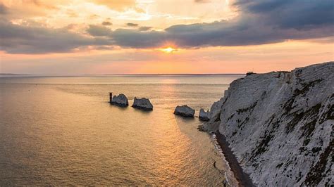 White coastal cliffs at sunset, rocks, cliff, sunset, white, clouds ...