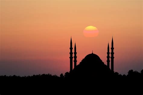 Premium Photo | Mosque silhouette in front of sunset background