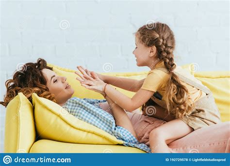 Child Playing Pat-a-cake Game Stock Photo - Image of lying, family ...