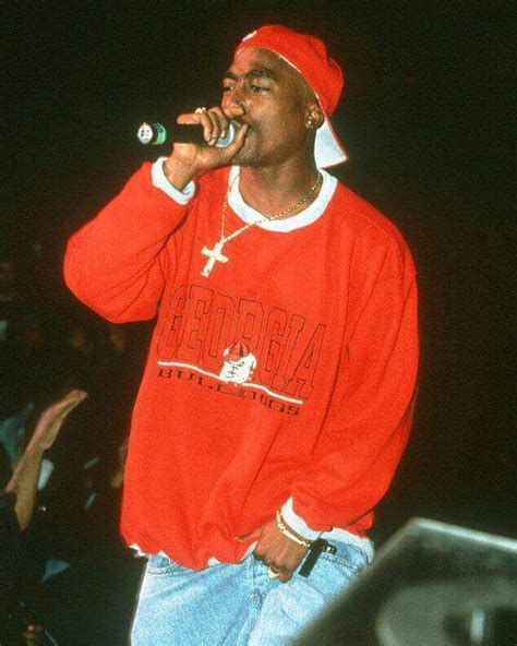 Tupac Shakur performing on stage. | Tupac shakur, Then vs now, Tupac