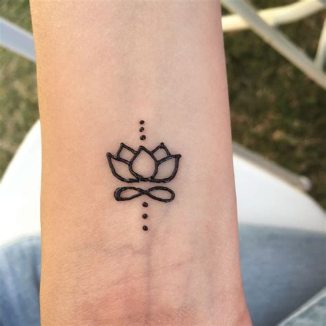 Simple Small Henna Hand Tattoo