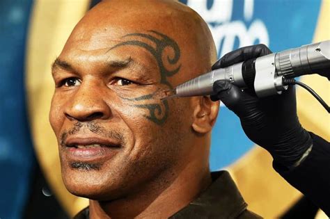 A Guide To Six Mike Tyson Tattoos and What They Mean