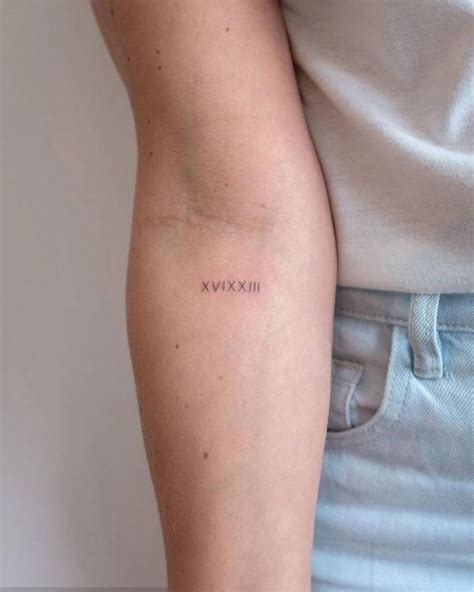 Roman numerals on the inner forearm. | Inner elbow tattoos, Elbow ...