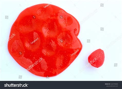 Bright red slime on white background. Education, creativity, childhood ...