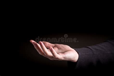 Man Holding His Hand and Showing Something Stock Photo - Image of ...