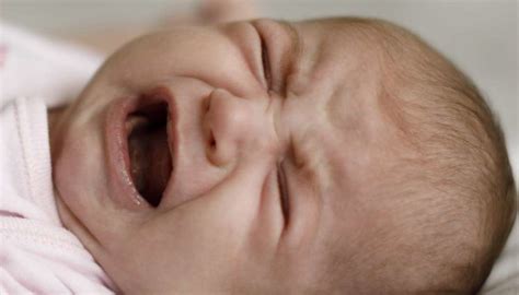 Baby crying in sleep: What's normal and how to soothe them