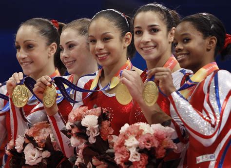 Short-handed U.S. wins gymnastics gold - CBS News