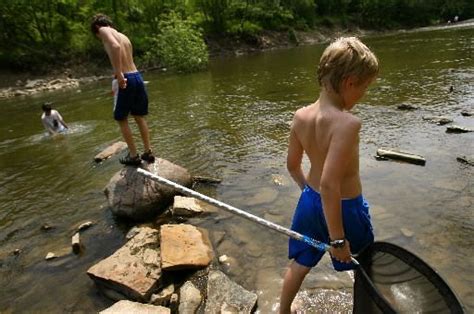 playing in creeks...we caught crawdads out of the creek that ran ...