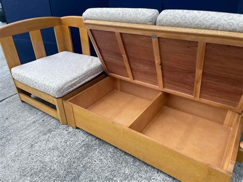 Wooden Sofa with storage on Carousell