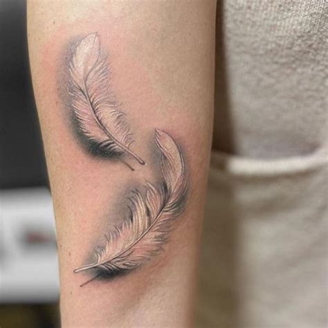 50 Beautiful Feather Tattoo Designs | Art and Design