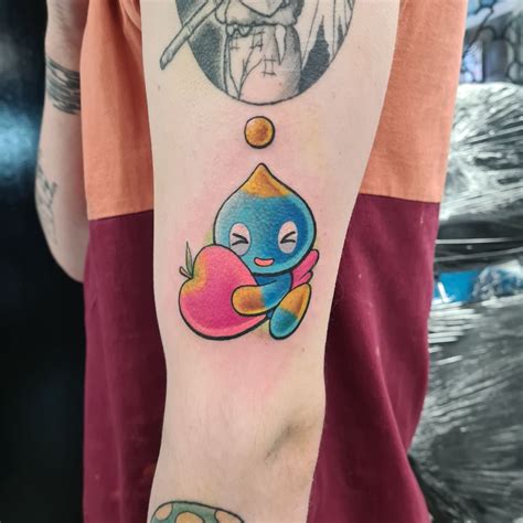 Chao holding peach tattoo | Tattoos, Gaming tattoo, Chaos tattoo