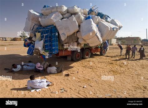 Totally overloaded truck at the oasis of Kufra, Kufrah, Al Kufrah ...