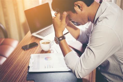 Stressed Man Working Royalty-Free Stock Photo