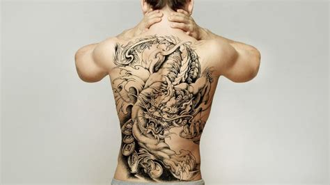 20 Cool Back Tattoos for Men in 2024 - The Trend Spotter