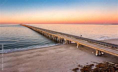 Aerial panorama of Chesapeake Bay Bridge Tunnel at sunset. CBBT is a 17 ...