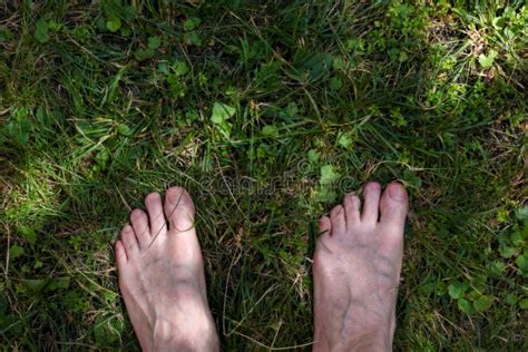 Male Adult Funny Feet on Green Grass Stock Photo - Image of outdoors ...