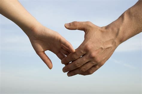 Black And White Hold Hands: Celebrating Unity In Diversity