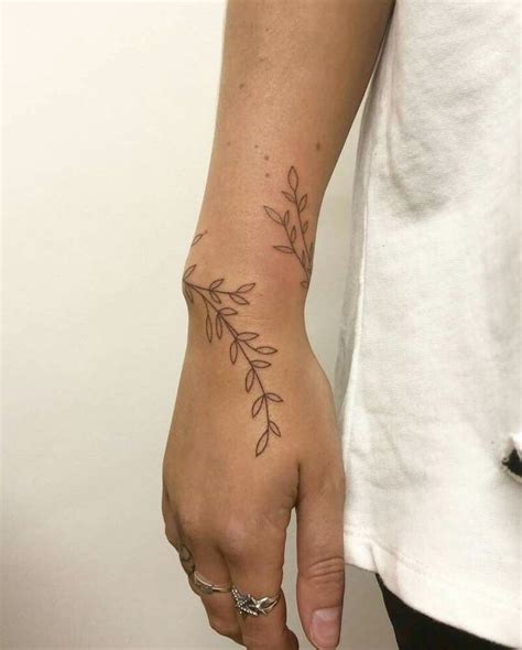 minimalist wrist plant tattoo, simple line drawing tattoo | Tattoos ...