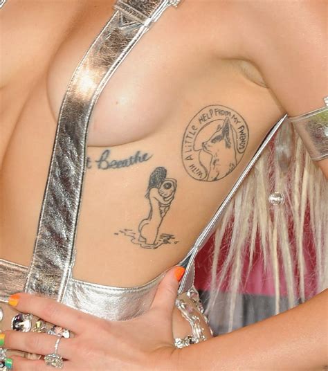 A Guide to Miley Cyrus's Most Meaningful Tattoos | POPSUGAR Beauty