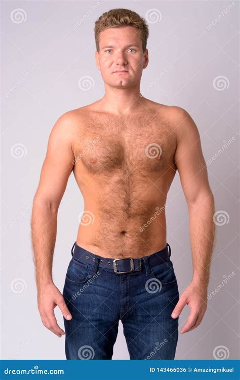 Portrait of Young Blonde Shirtless Man with Chest Hair Looking at ...