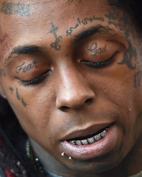 12 Most Fascinating Rapper Tattoos and the True Stories Behind Them