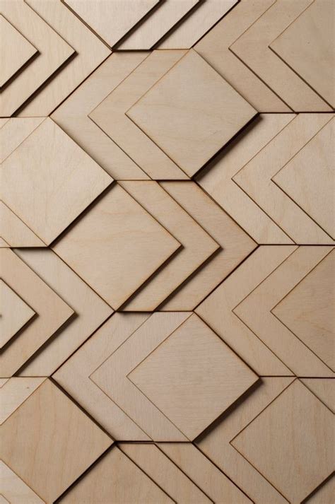 Overlapping CNC'ed wood panels create a beautiful geometric design ...