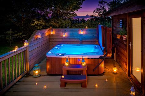 Pin by Elizabeth Welsch on Dream Board | Hot tub landscaping, Lodges ...