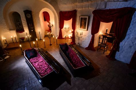 Two Canadians sleeping in coffins at Dracula's Castle in Romania | CTV News