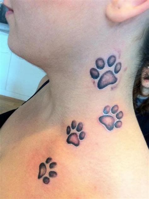 Paw Print Trail Tattoo On Back