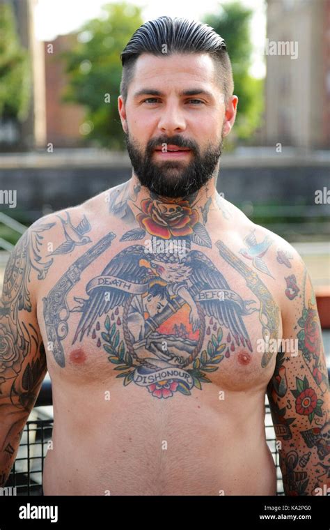 London, UK. 24th September, 2017. A heavily tattooed man at the 13th ...