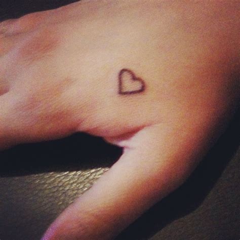 heart tattoo designs on hand - Janessa Moser