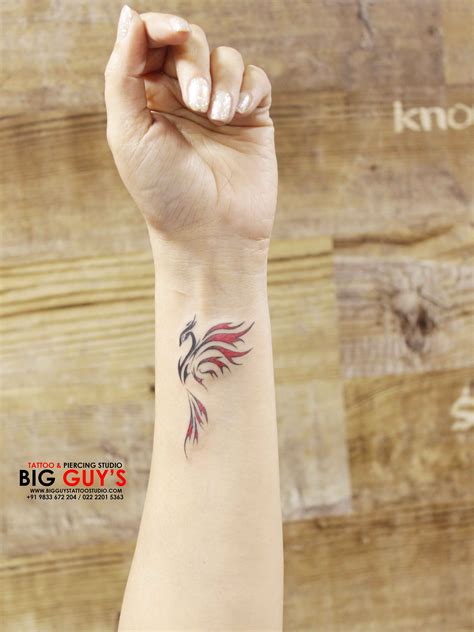 Phoenix tattoo small | Phoenix tattoo feminine, Wrist tattoos for guys ...