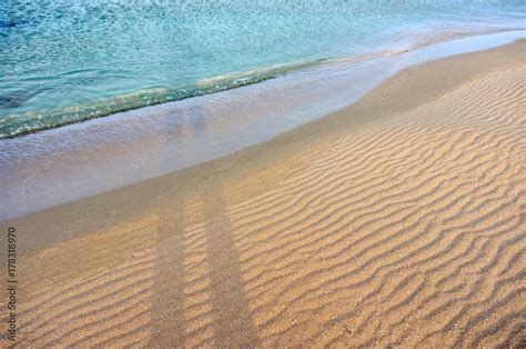 Sands on the beach. A beach is a landform along a body of water. It ...