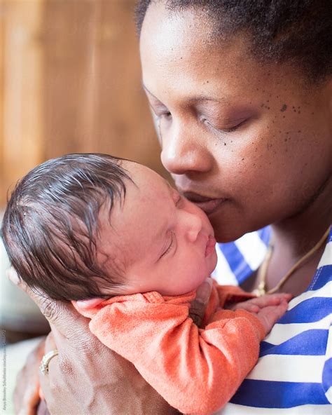 "A Black Mother Holding Her Biracial Newborn Baby Lovingly" by Stocksy ...