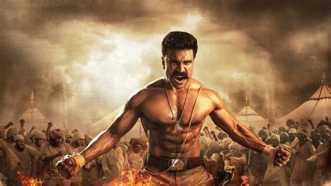 Ram Charan's New Poster from 'RRR' All Muscle and Action - IndiaWest ...