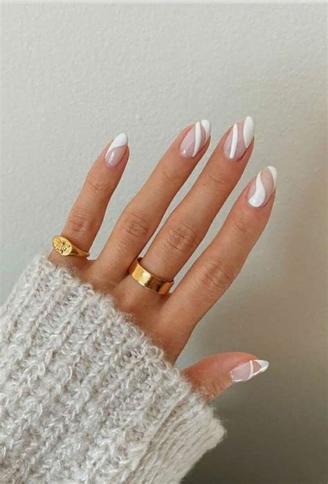 Check out these white swirl nail designs! They look great with gold ...