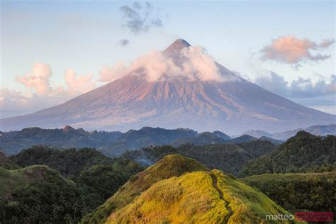 - Sunset over Mayon volcano, Albay, Philippines | Royalty Free Image