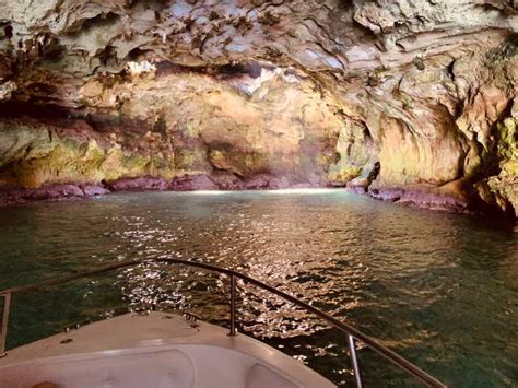 Polignano a Mare: Boat Cave Tour with Aperitif | GetYourGuide