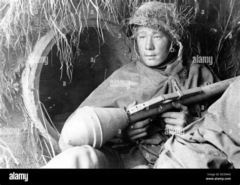 A member of the German Wehrmacht with a panzerfaust (anti-tank warhead ...